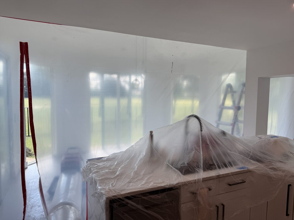 Negative-air containment set up in a home